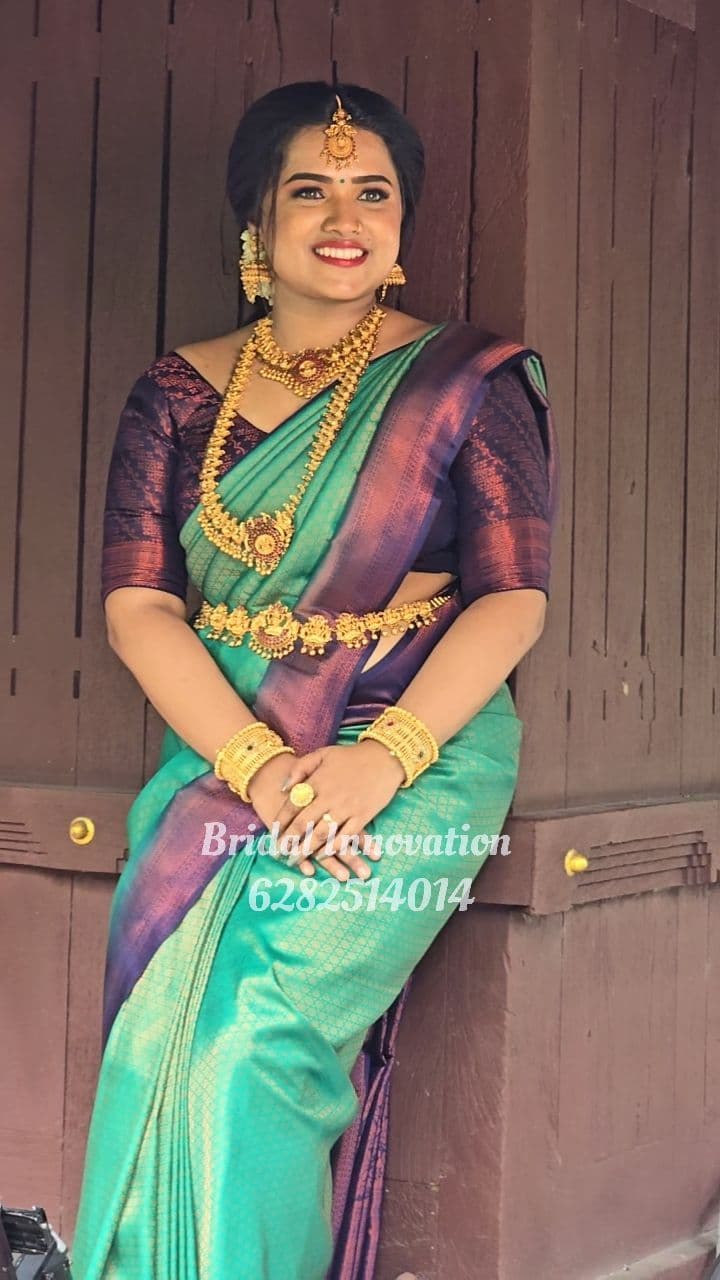 Bridal Innovation legacy portfolio look 5, showing Kerala bridal makeup, hair styling, saree, jewellery, or ceremony details.