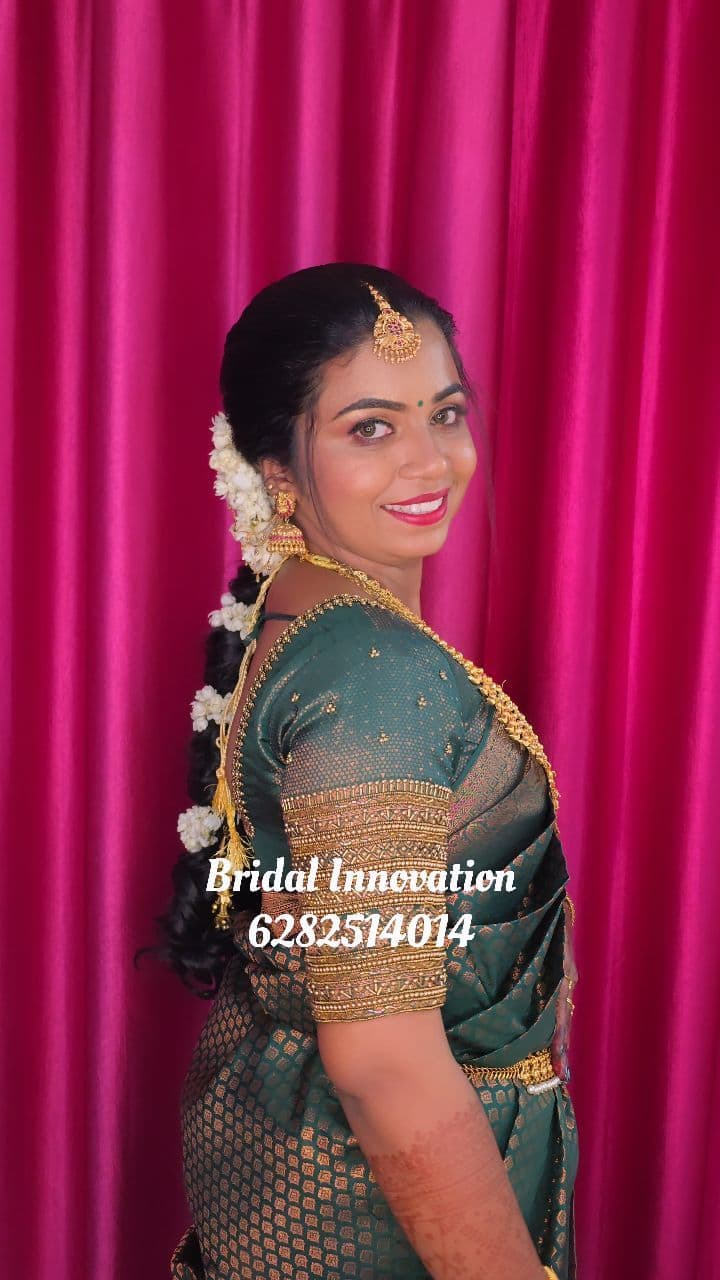 Bridal Innovation legacy portfolio look 9, showing Kerala bridal makeup, hair styling, saree, jewellery, or ceremony details.