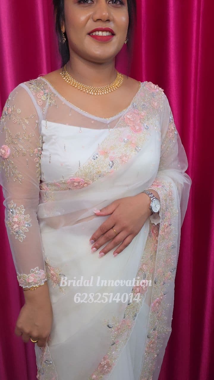 Bridal Innovation legacy portfolio look 11, showing Kerala bridal makeup, hair styling, saree, jewellery, or ceremony details.