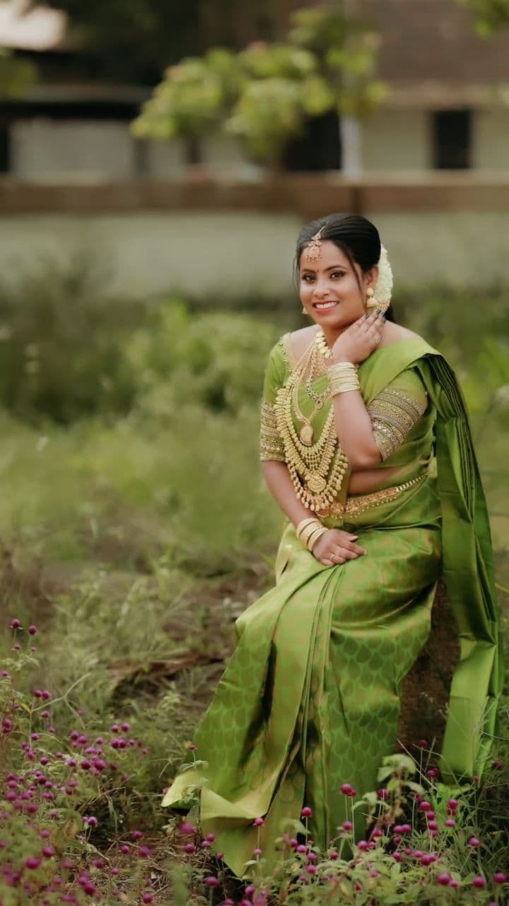 Bridal Innovation legacy portfolio look 16, showing Kerala bridal makeup, hair styling, saree, jewellery, or ceremony details.