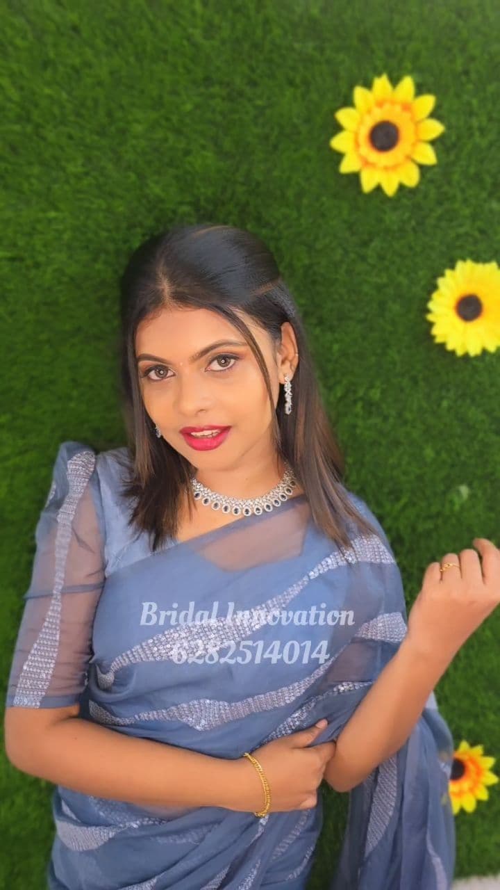 Bridal Innovation legacy portfolio look 31, showing Kerala bridal makeup, hair styling, saree, jewellery, or ceremony details.