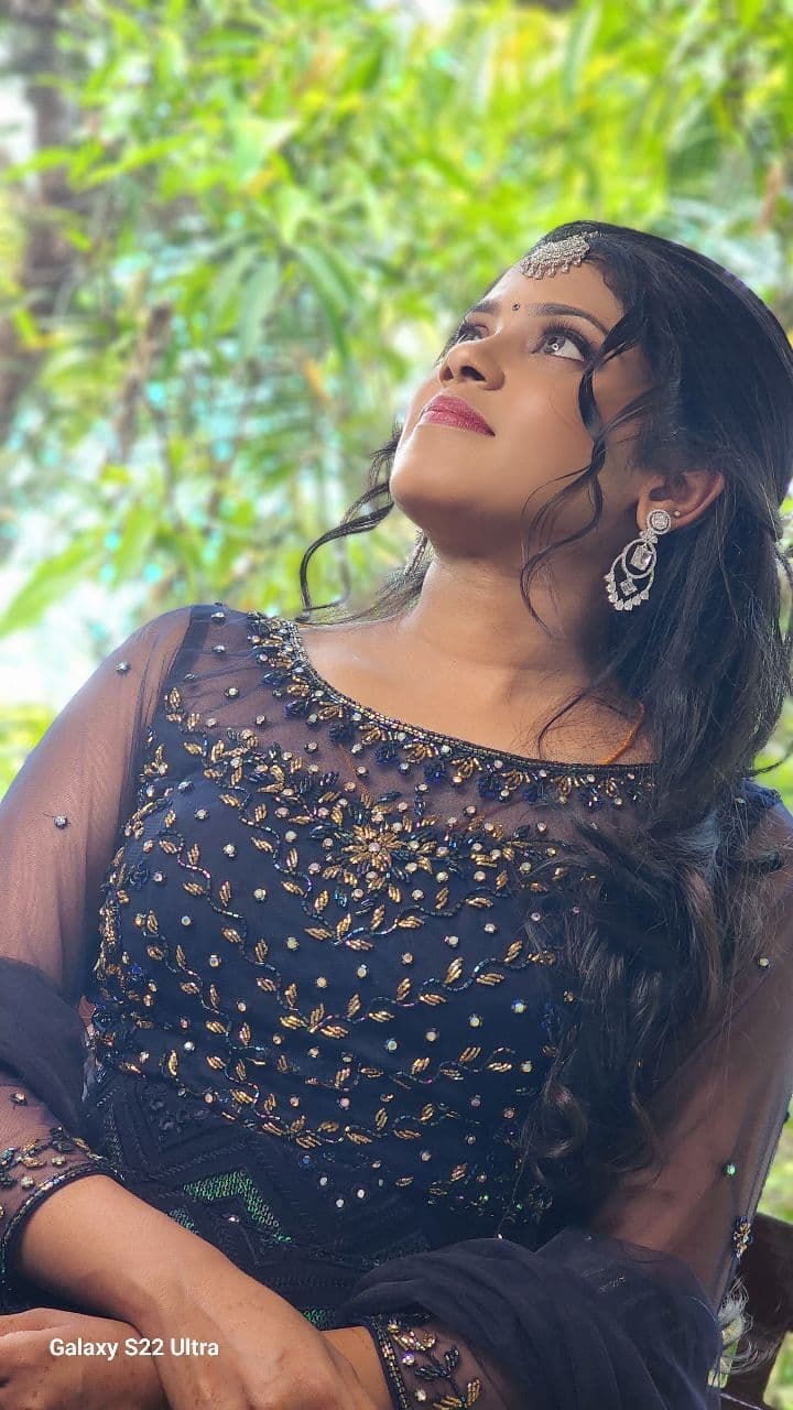 Bridal Innovation legacy portfolio look 34, showing Kerala bridal makeup, hair styling, saree, jewellery, or ceremony details.