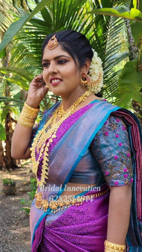 Bridal Innovation legacy portfolio look 36, showing Kerala bridal makeup, hair styling, saree, jewellery, or ceremony details.