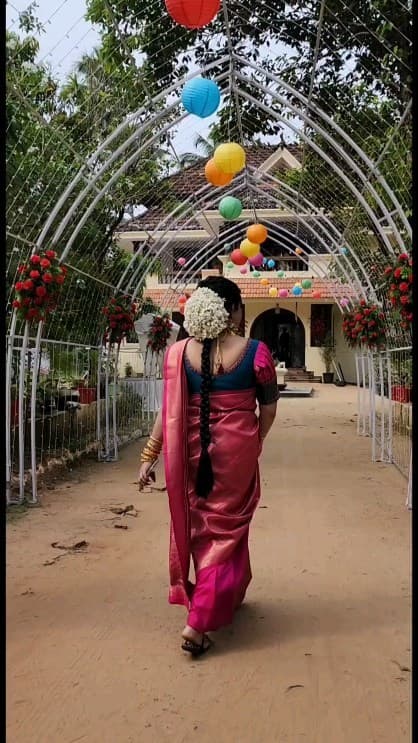 Bridal Innovation legacy portfolio look 44, showing Kerala bridal makeup, hair styling, saree, jewellery, or ceremony details.