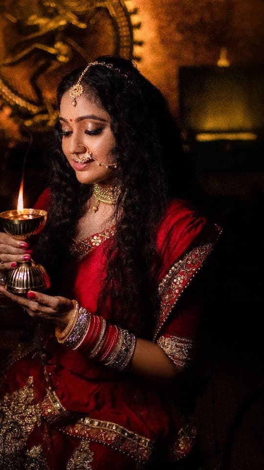 Bridal Innovation legacy portfolio look 52, showing Kerala bridal makeup, hair styling, saree, jewellery, or ceremony details.