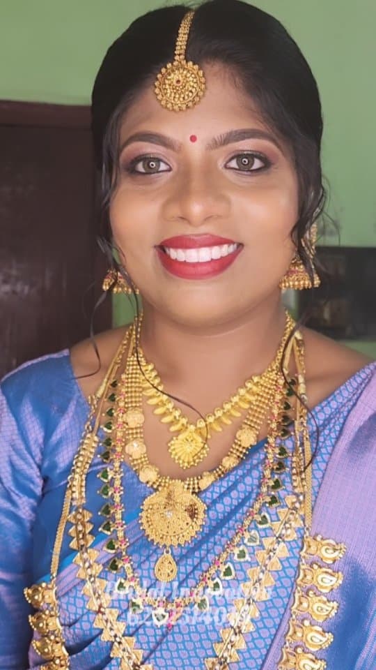 Bridal Innovation legacy portfolio look 54, showing Kerala bridal makeup, hair styling, saree, jewellery, or ceremony details.