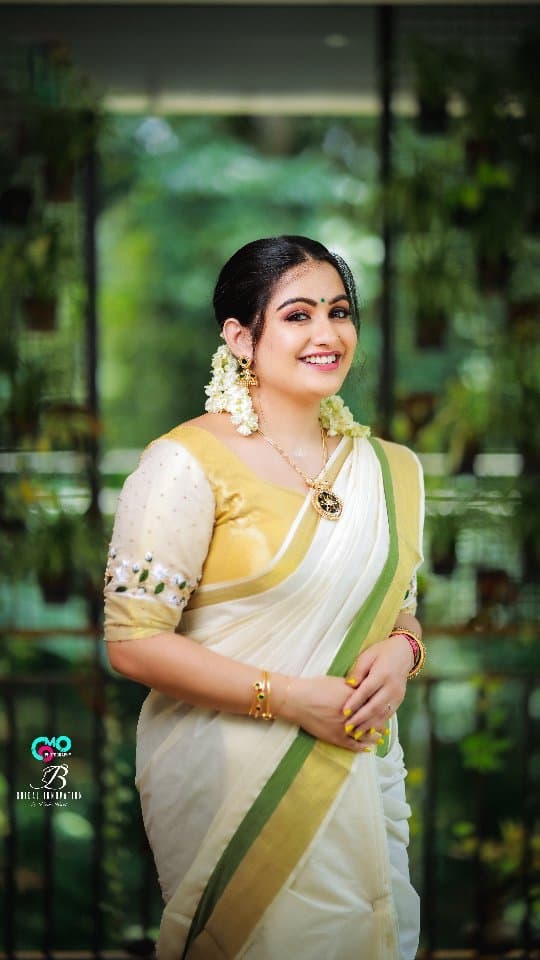 Bridal Innovation legacy portfolio look 55, showing Kerala bridal makeup, hair styling, saree, jewellery, or ceremony details.