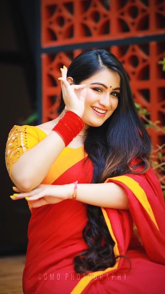 Bridal Innovation legacy portfolio look 60, showing Kerala bridal makeup, hair styling, saree, jewellery, or ceremony details.