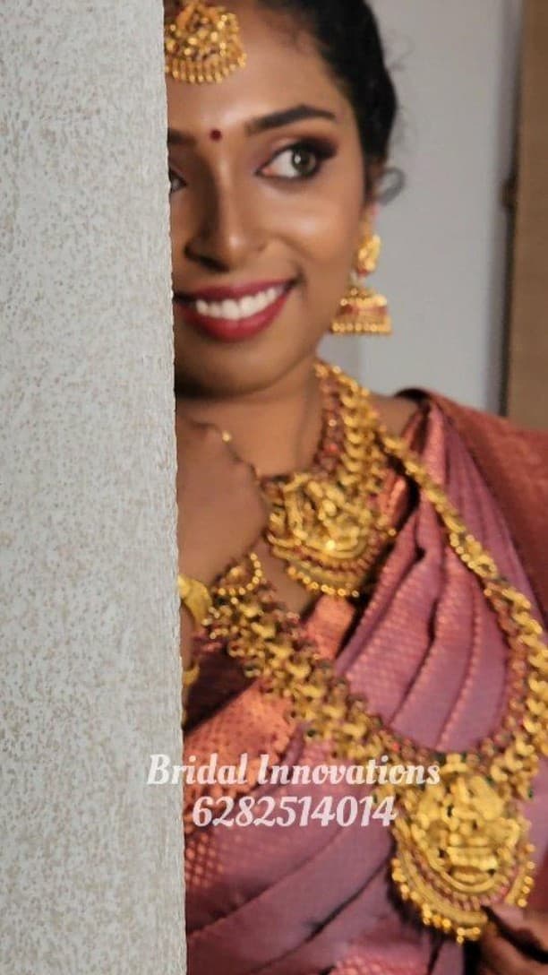 Bridal Innovation legacy portfolio look 63, showing Kerala bridal makeup, hair styling, saree, jewellery, or ceremony details.