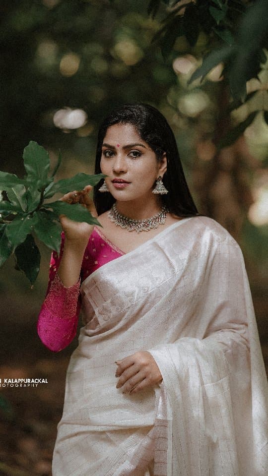 Bridal Innovation legacy portfolio look 65, showing Kerala bridal makeup, hair styling, saree, jewellery, or ceremony details.