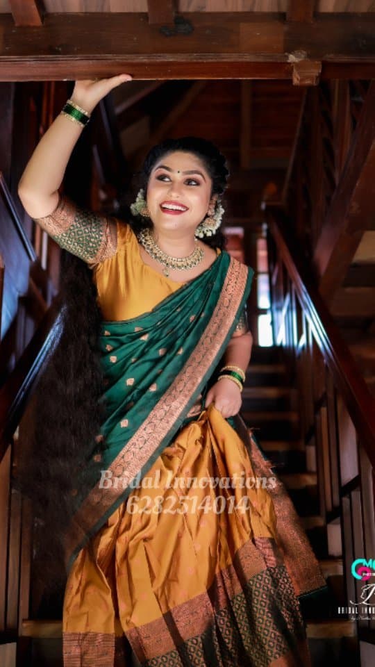 Bridal Innovation legacy portfolio look 66, showing Kerala bridal makeup, hair styling, saree, jewellery, or ceremony details.