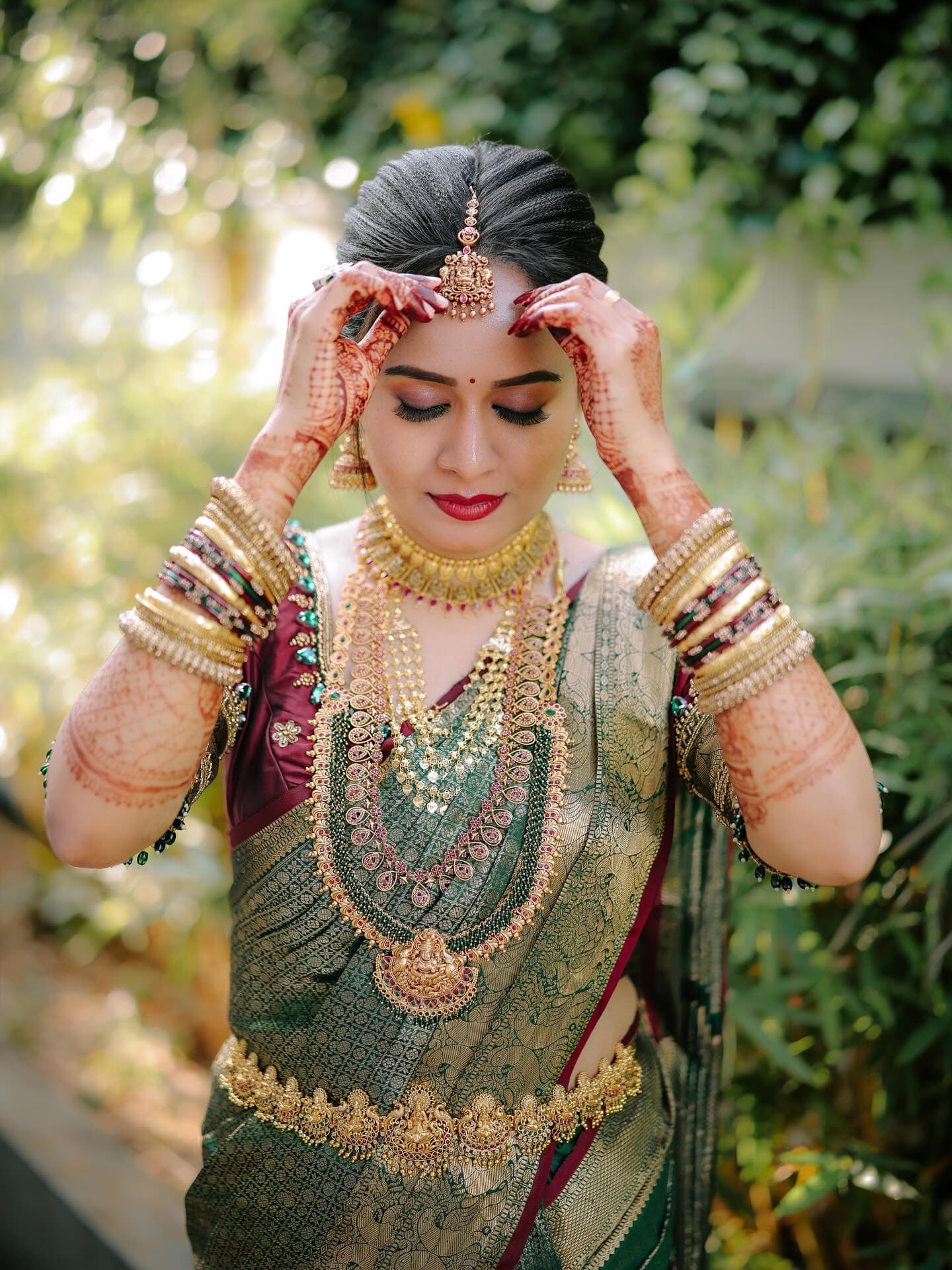 Bridal Innovation portfolio look 16, showing Kerala bridal makeup, hair styling, saree, jewellery, or ceremony details.