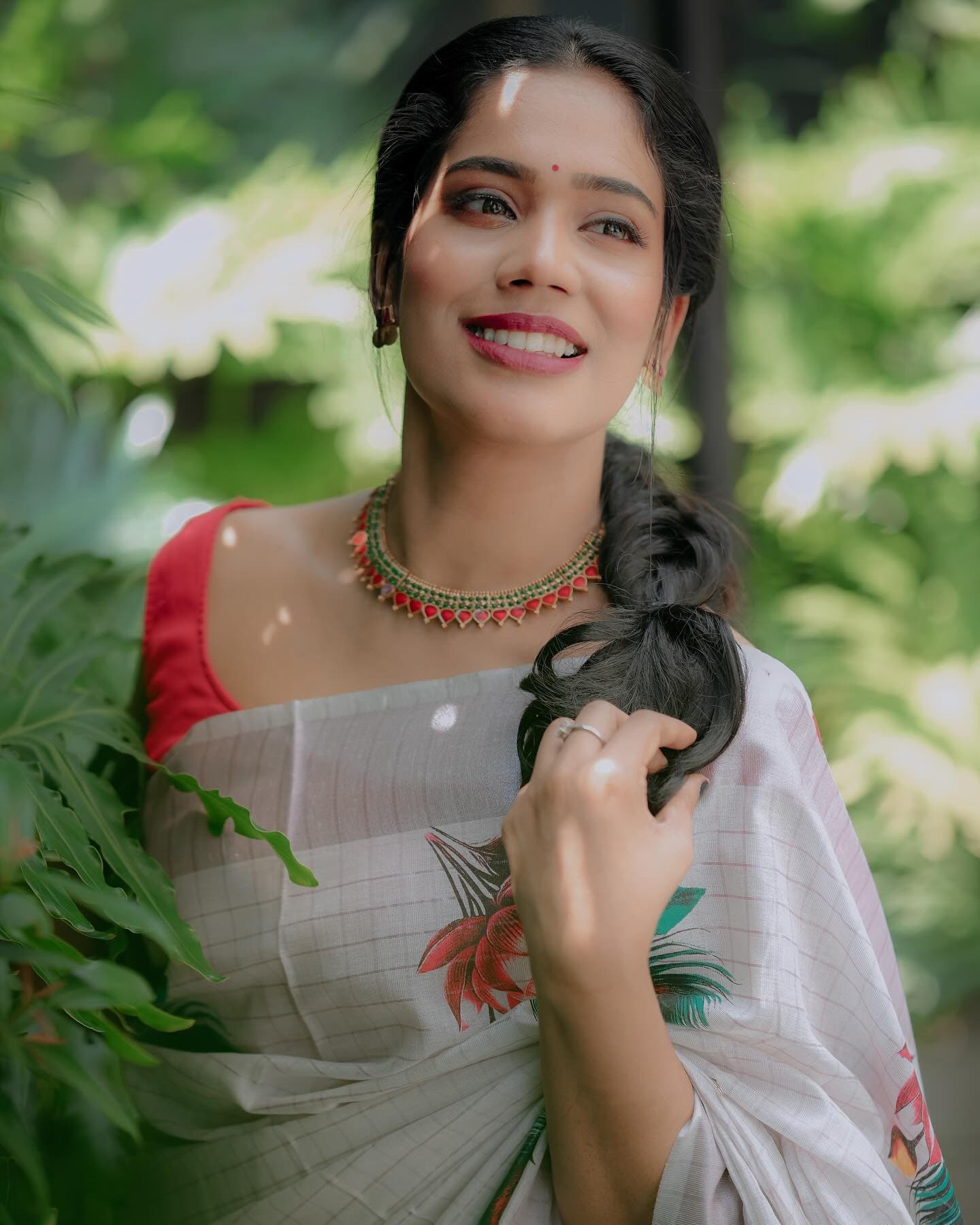 Bridal Innovation portfolio look 19, showing Kerala bridal makeup, hair styling, saree, jewellery, or ceremony details.