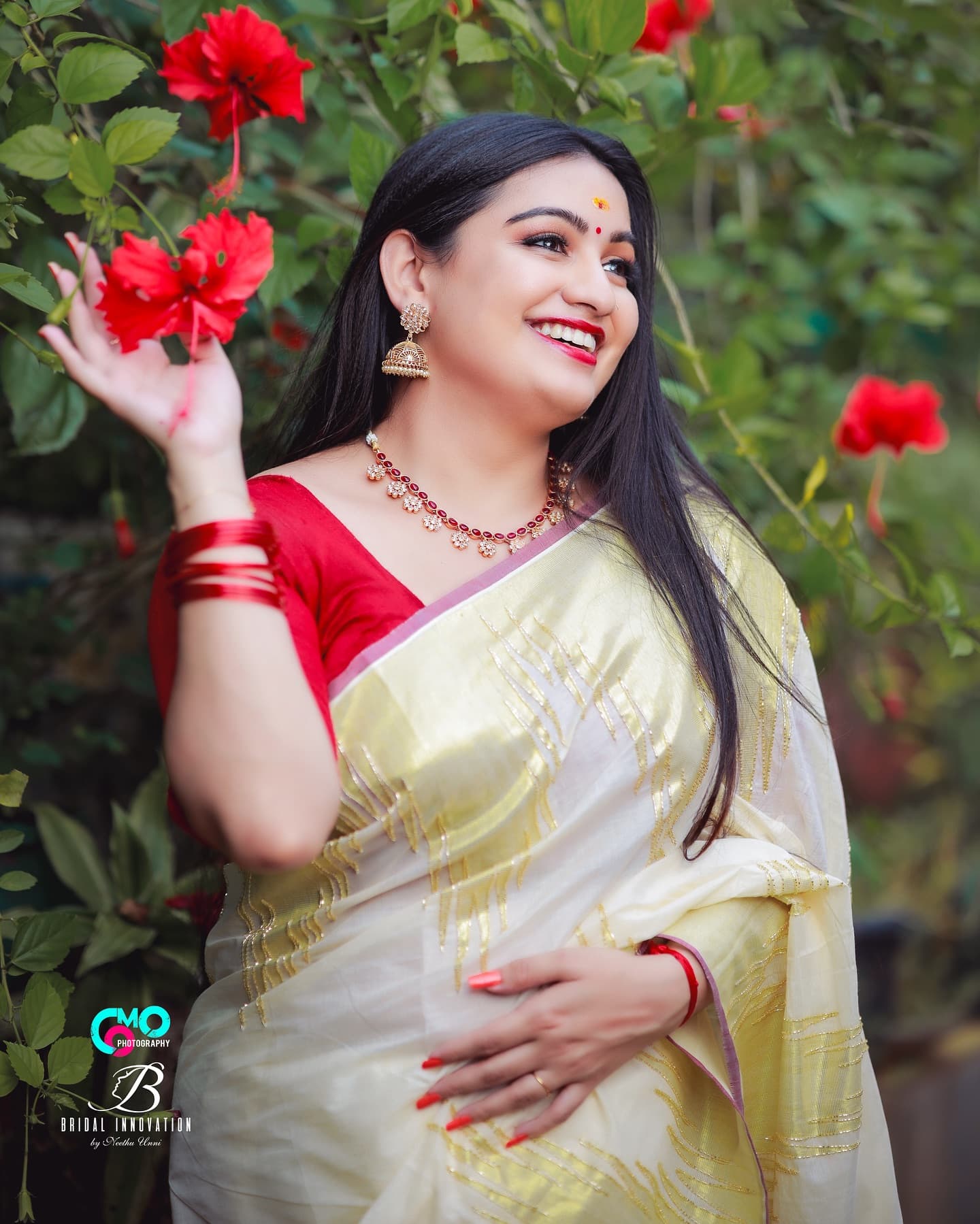 Bridal Innovation portfolio look 21, showing Kerala bridal makeup, hair styling, saree, jewellery, or ceremony details.