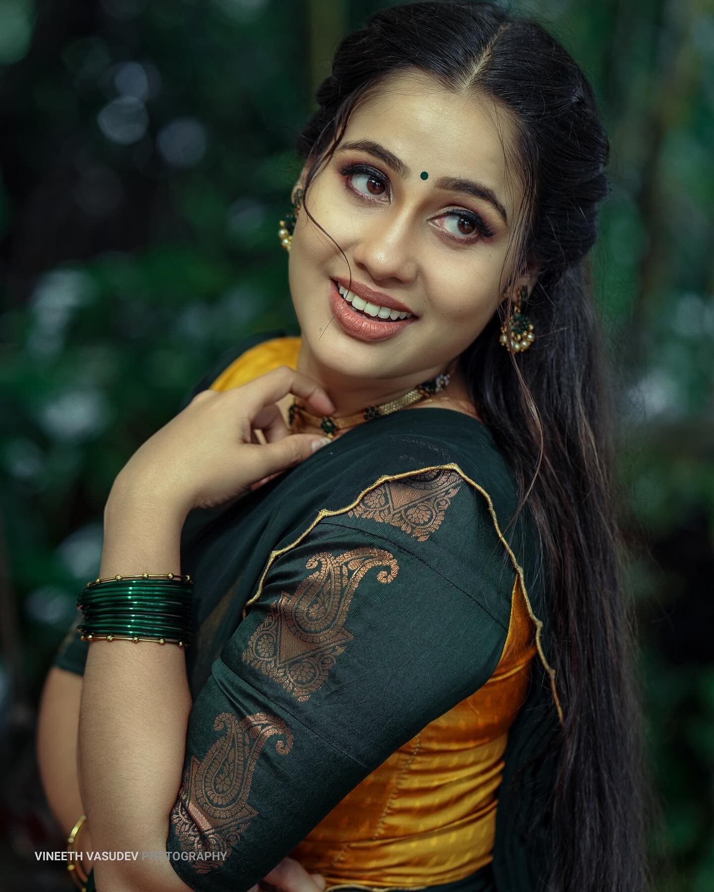 Bridal Innovation portfolio look 22, showing Kerala bridal makeup, hair styling, saree, jewellery, or ceremony details.